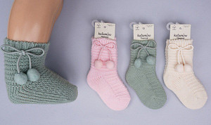 Вязанные носочки с аксессуаром для девочки  KATAMINO